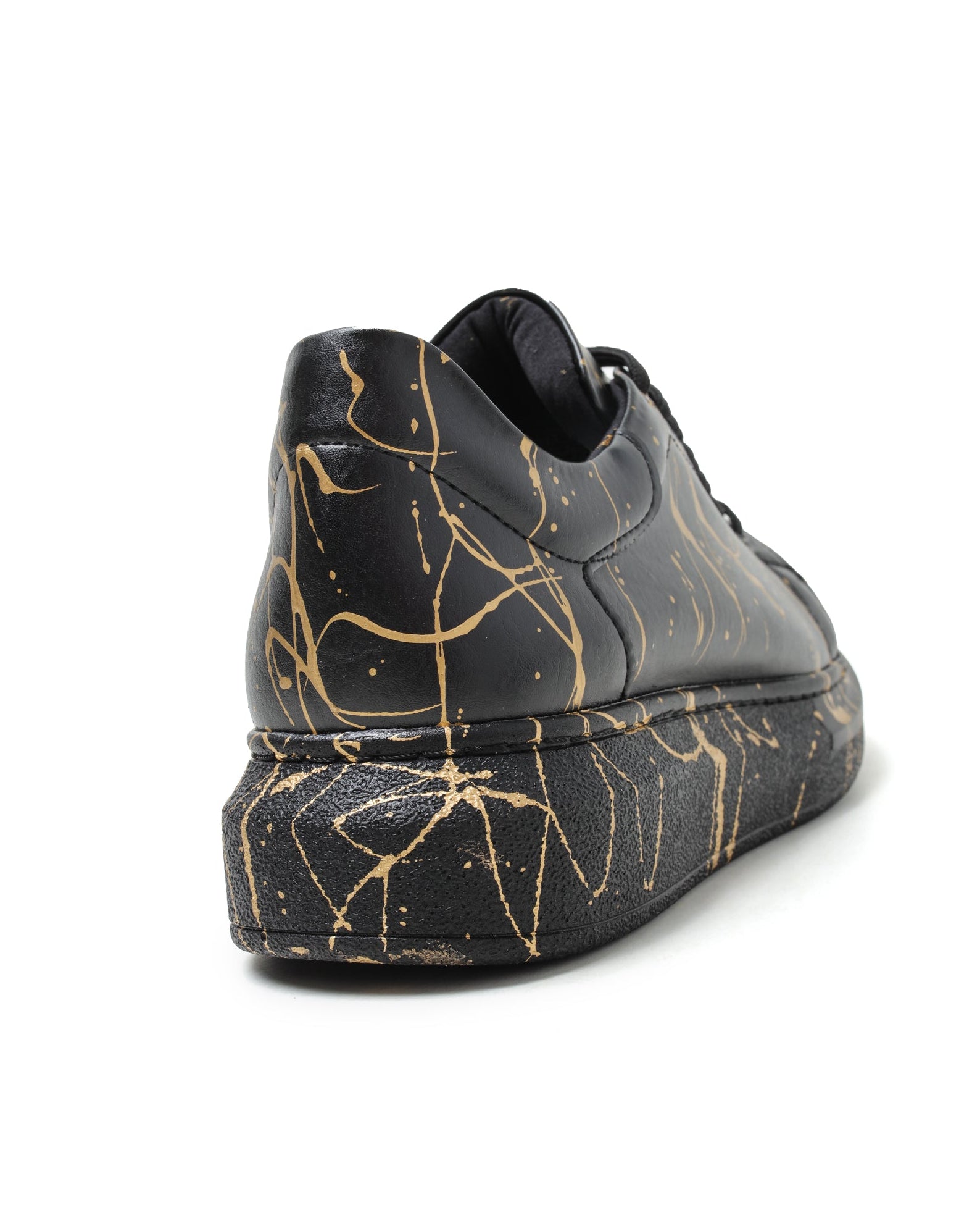 Stardust Pulse black and gold splatter sneaker by Apollo Moda, fourth angle
