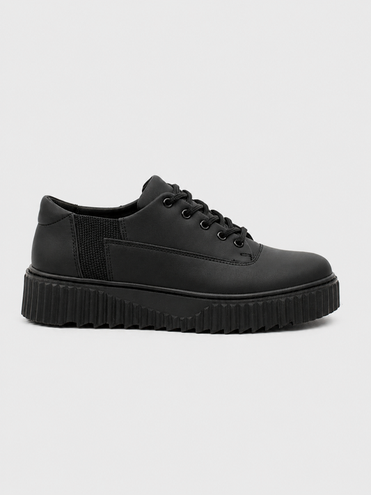 Apollo Moda Men's Zephyr Noir all-black platform sneaker with ridged sole, main product photo