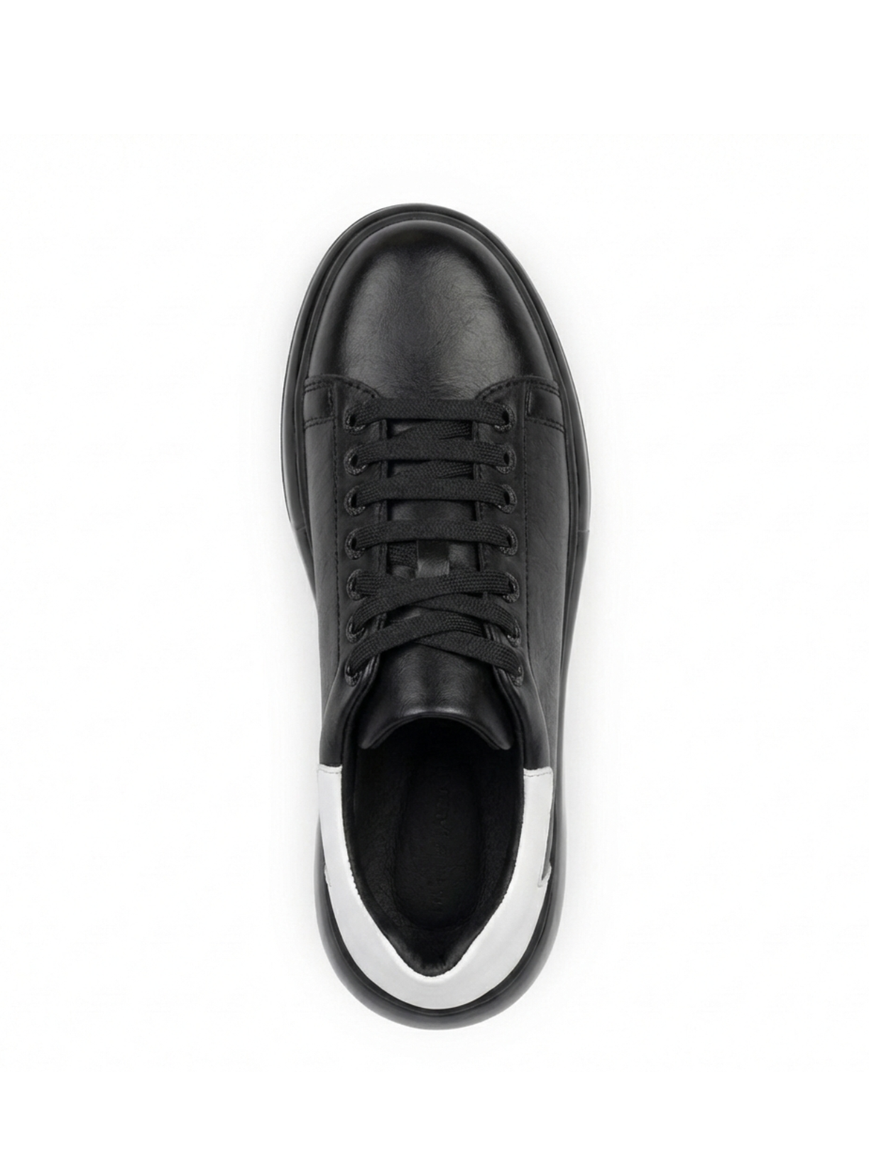 Black leather sneaker with white sole on a white background